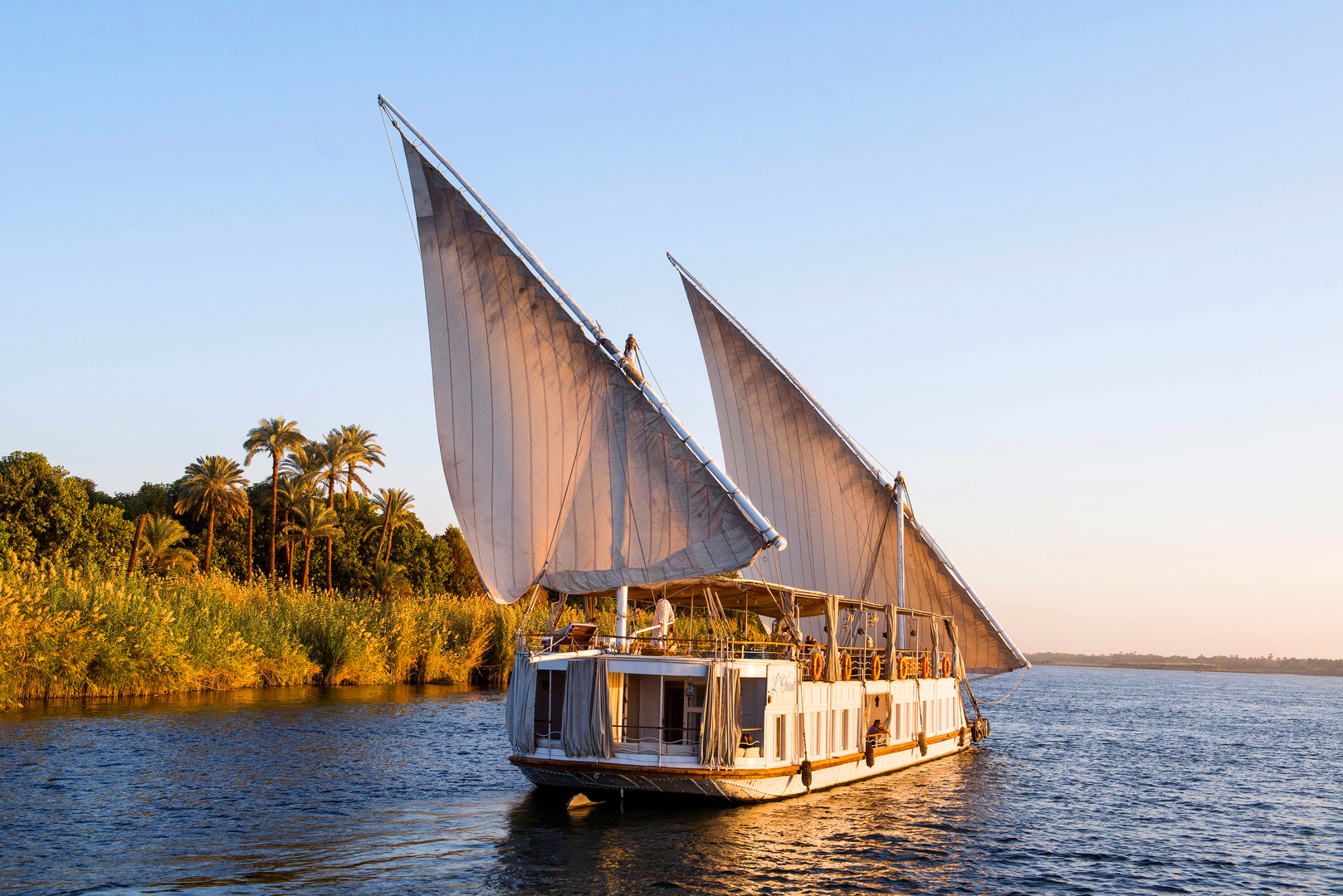 A boat sailing on the River Nile - one of the best family adventure holidays