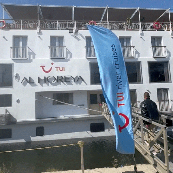 A person walks onto the Al Horeya river cruise ship.