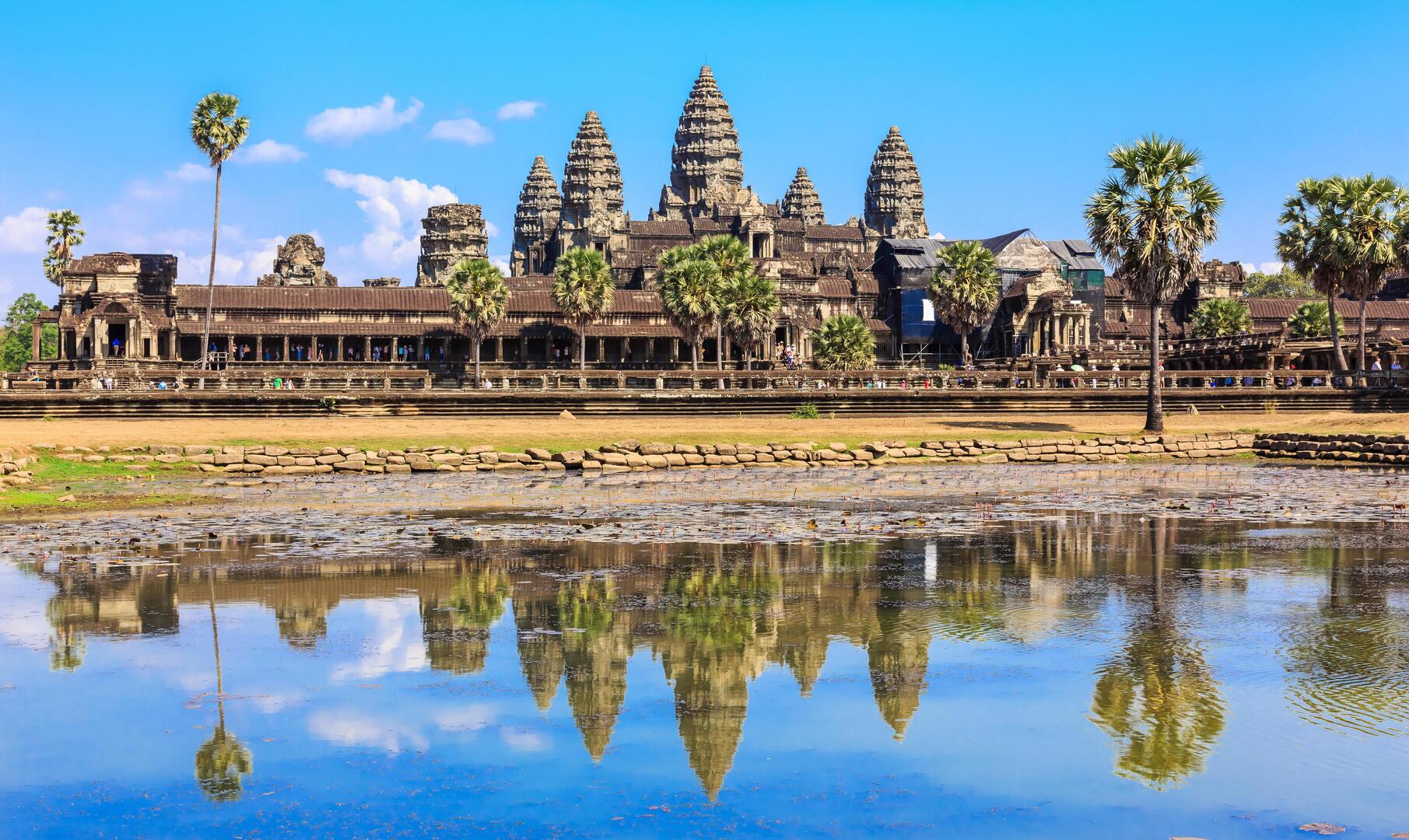 Angkor Wat temple reflected in a pond.